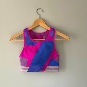 Nike sz M “Seamless Icon Clash Bra” in Fire Pink, Sapphire & Desert Dust